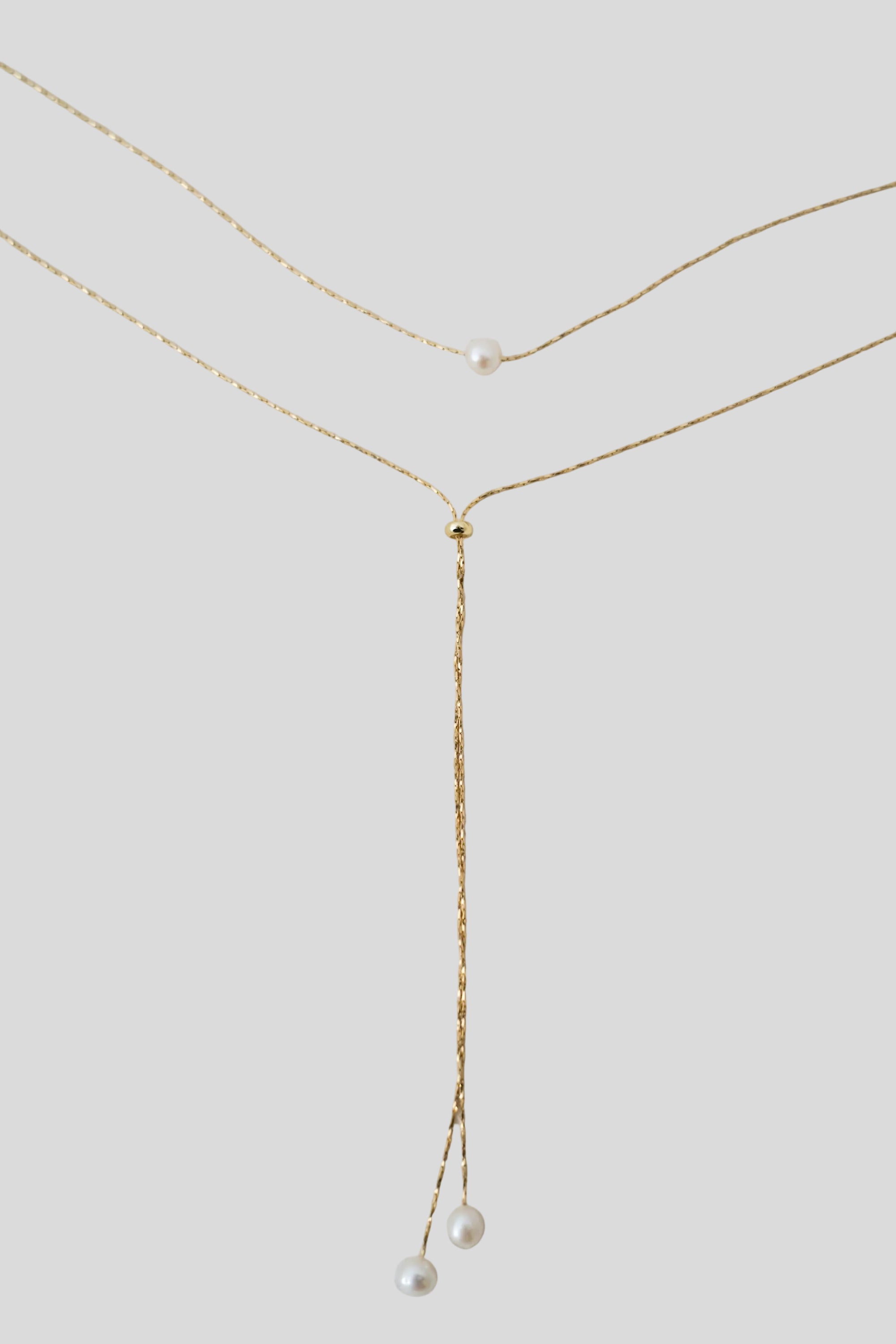 Collier de dos chaîne serpent torsadée perles naturelles