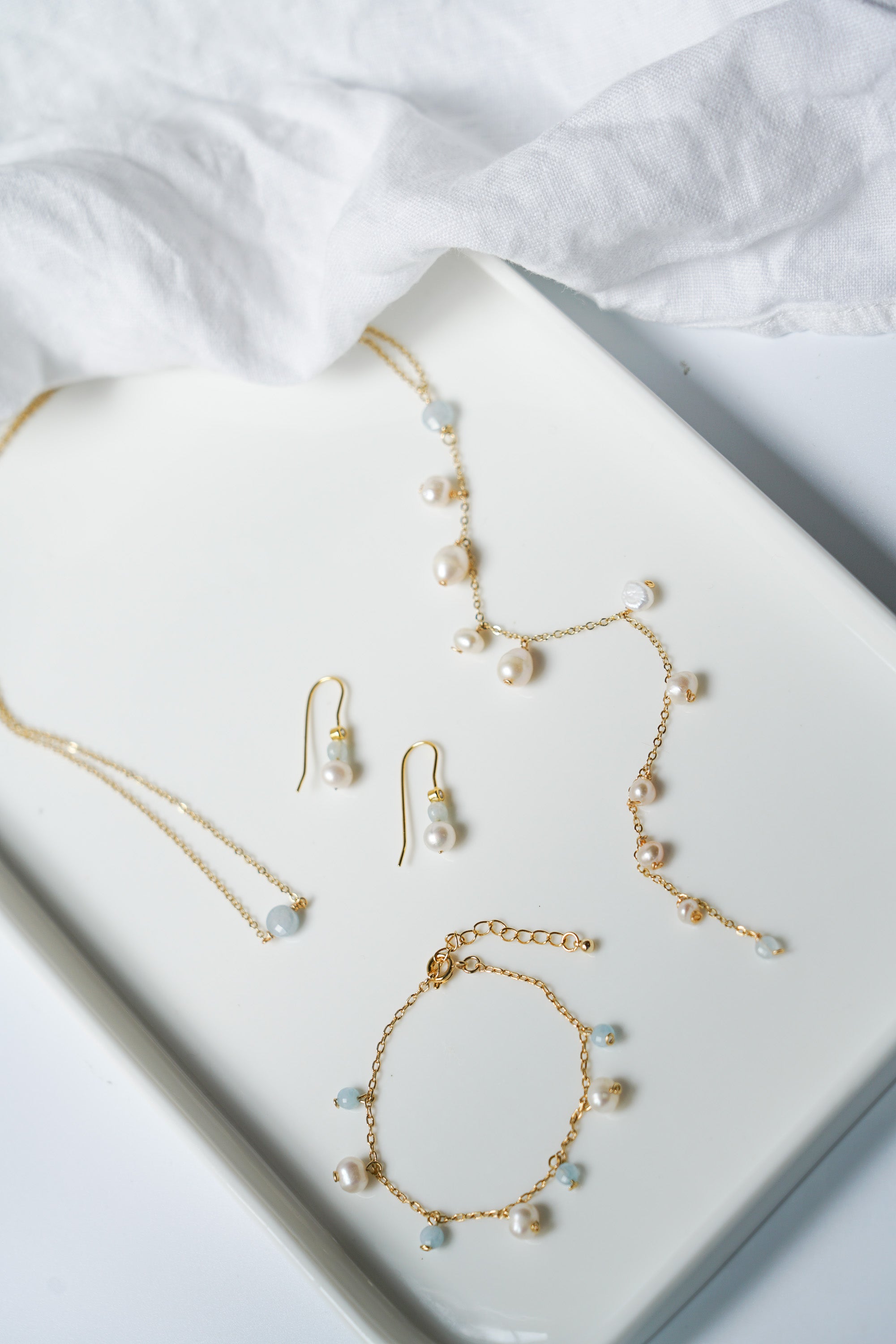 Collier de dos quelque chose de bleu