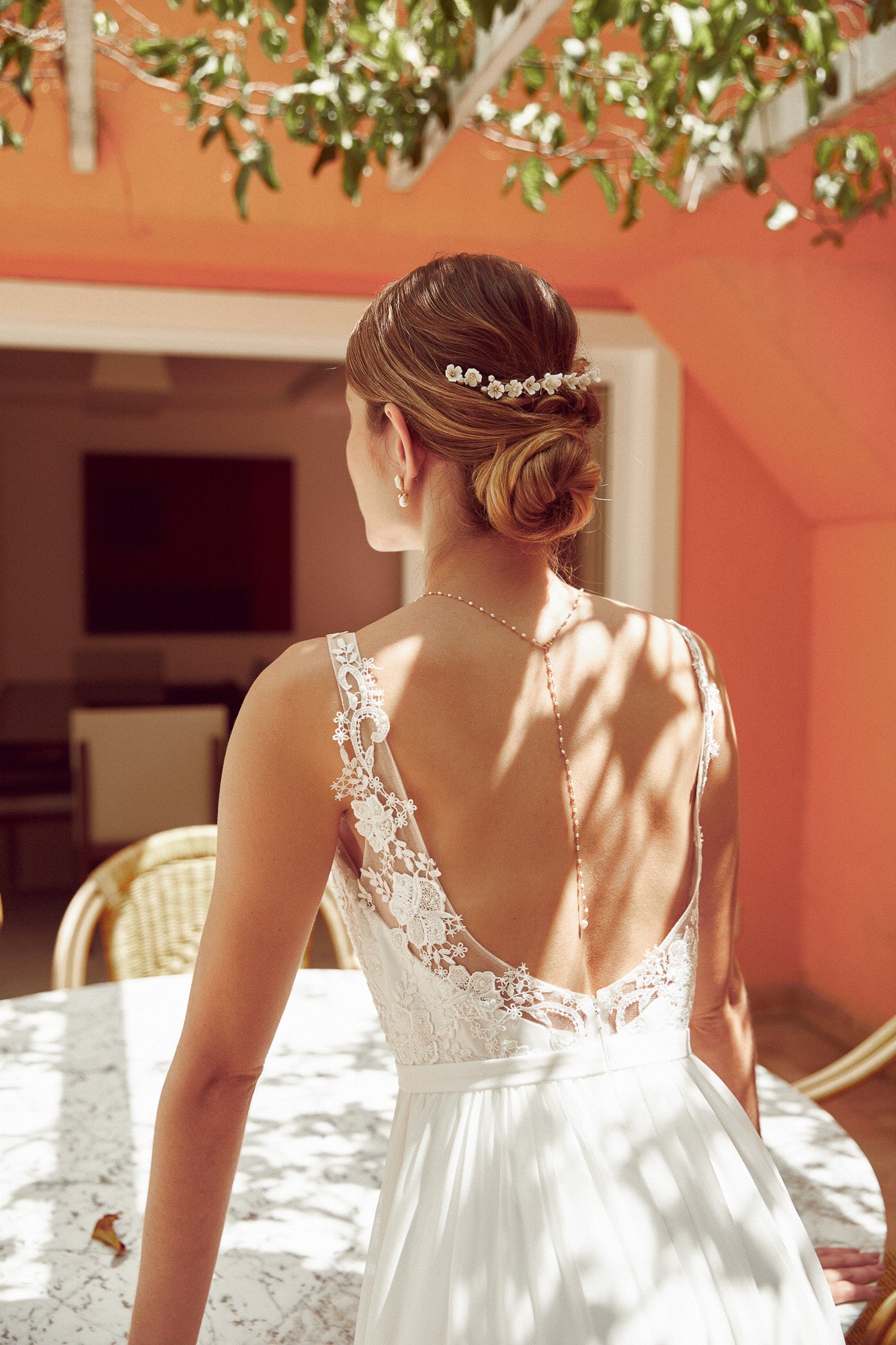 Bijou de dos or avec perles de culture naturelles