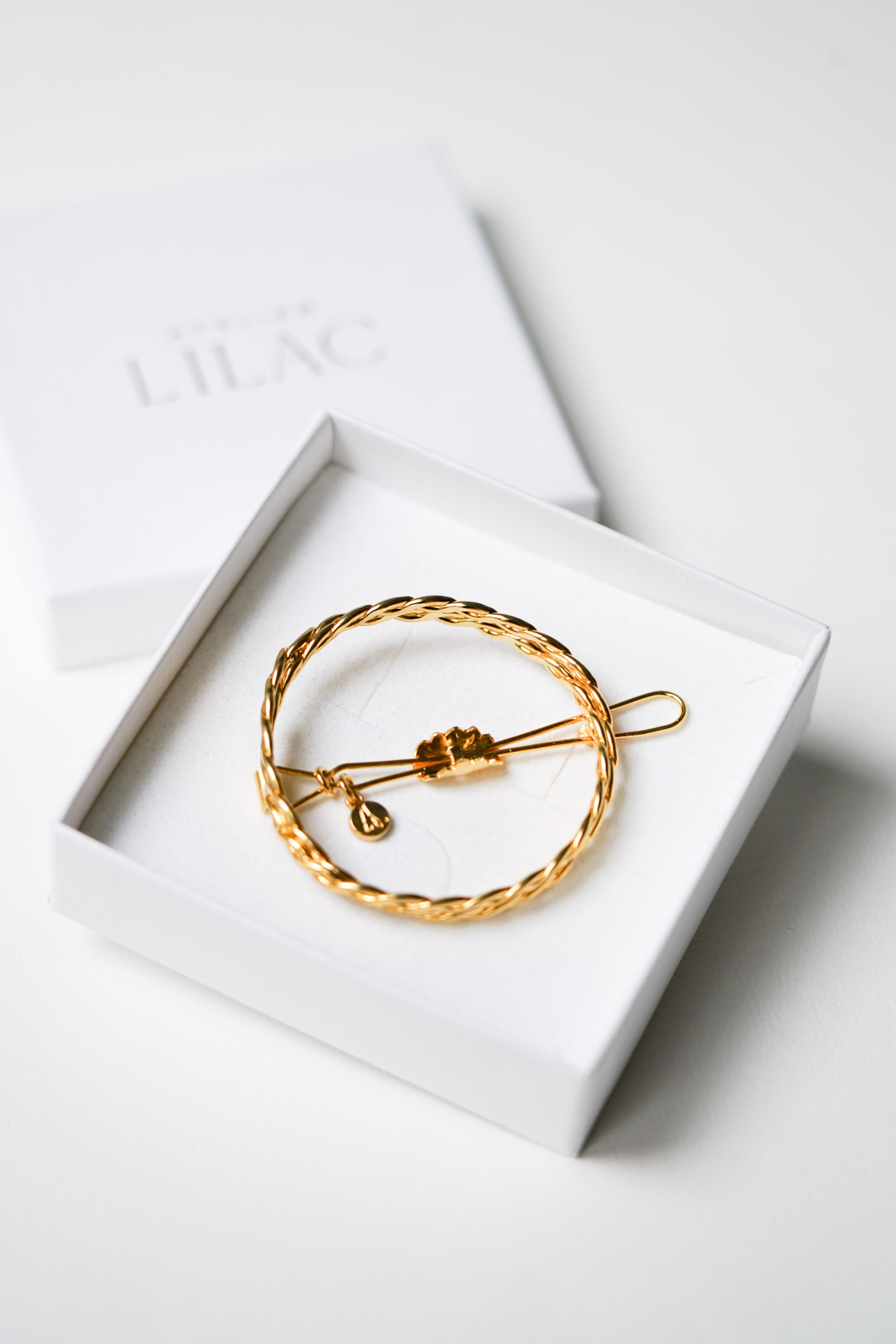 cadeau mariage barrette en or tressé dans sa boîte blanche