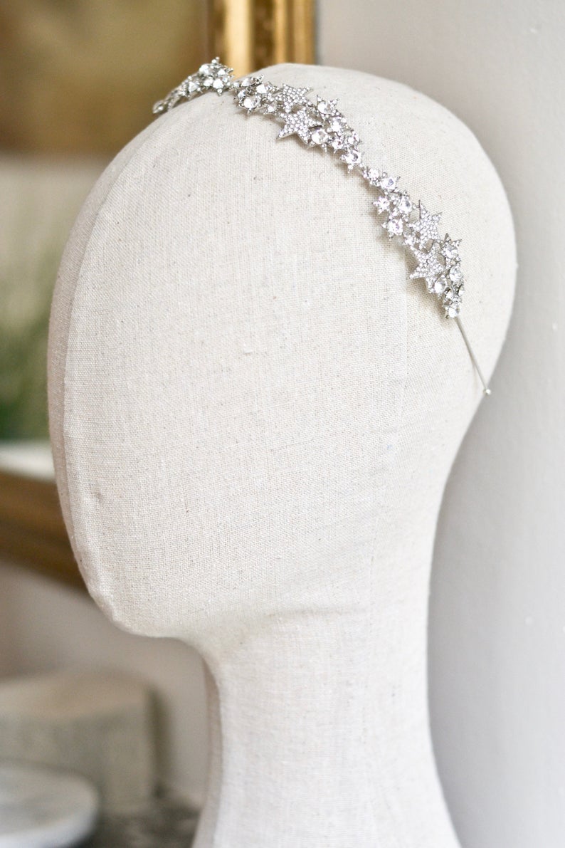 headband étoile en argent sur la tête mannequin