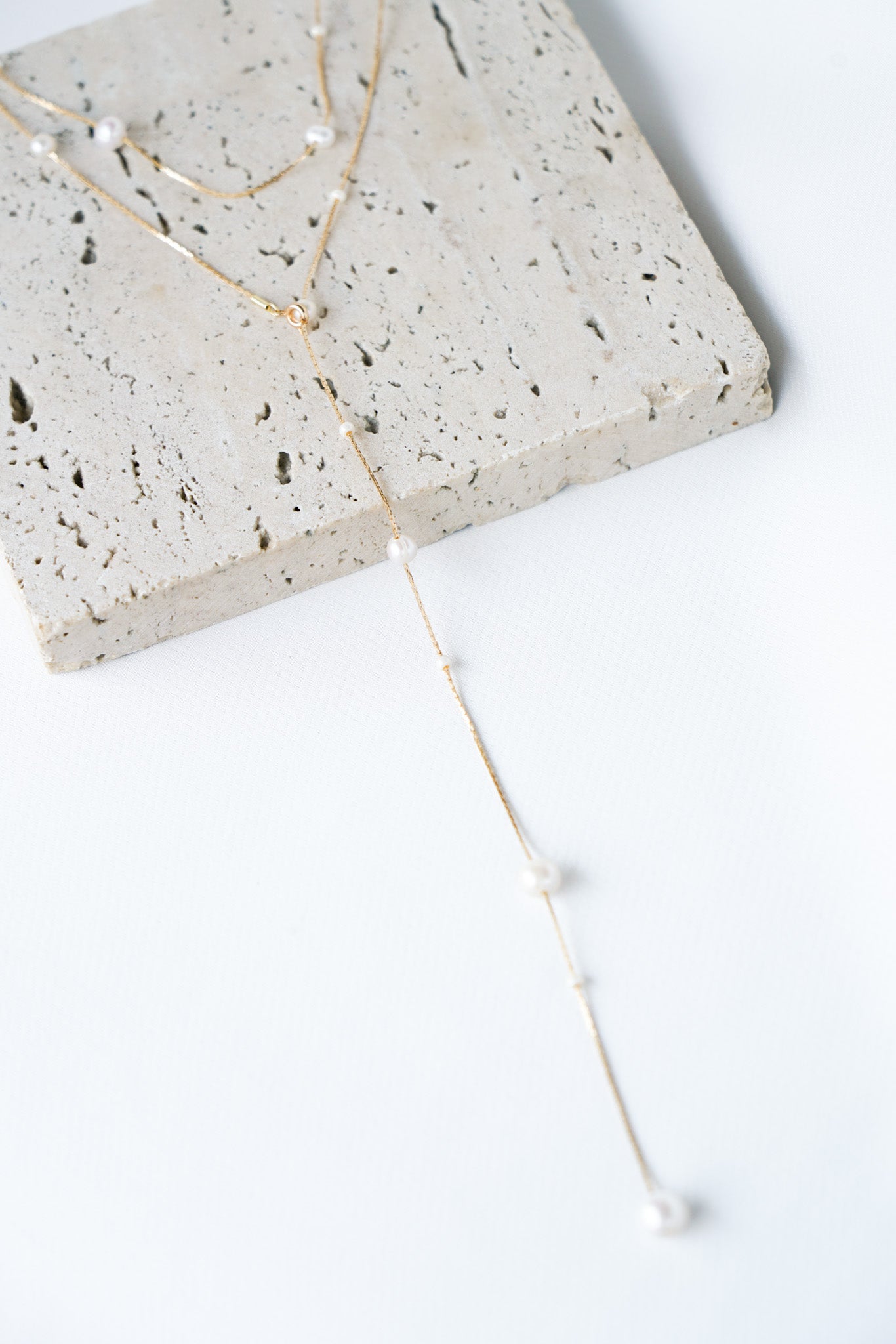 Collier de dos à perles