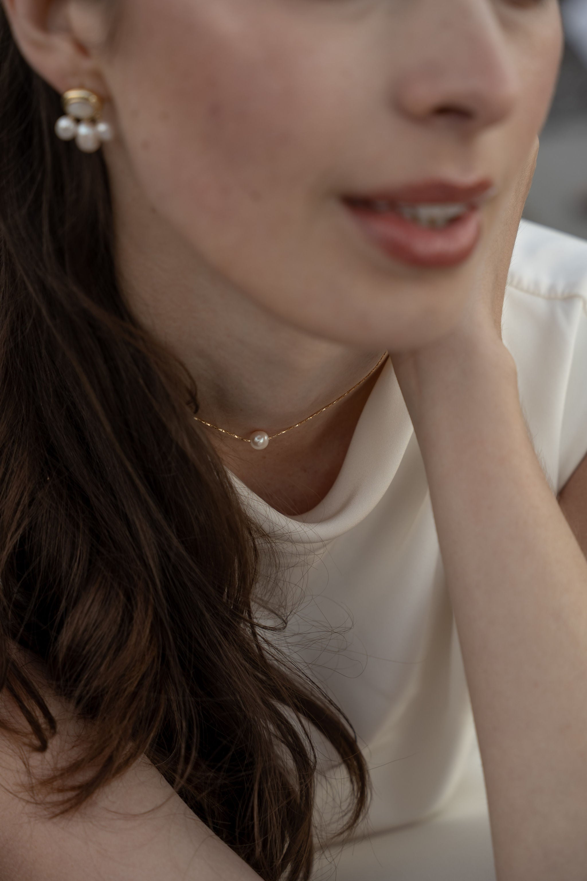 collier de dos perles naturelles et chaine or 