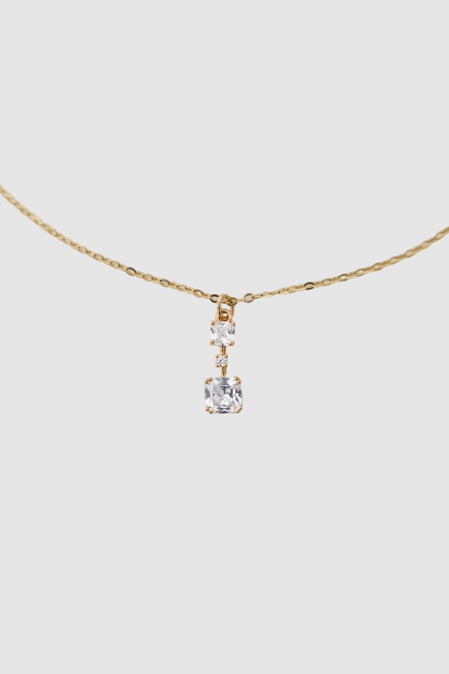 Collier pendentif zircons