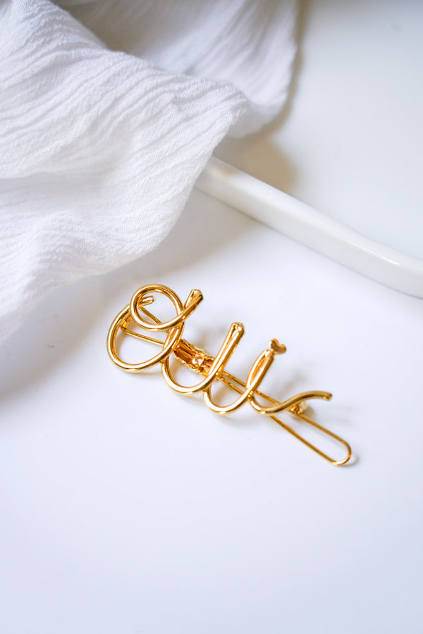 barrette cheveux de mariage avec l'inscription OUI en or