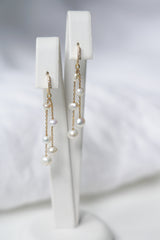 Boucles d'oreilles pendantes à perles et cristaux