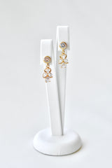 Boucles d'oreilles pendantes dorés à cristaux
