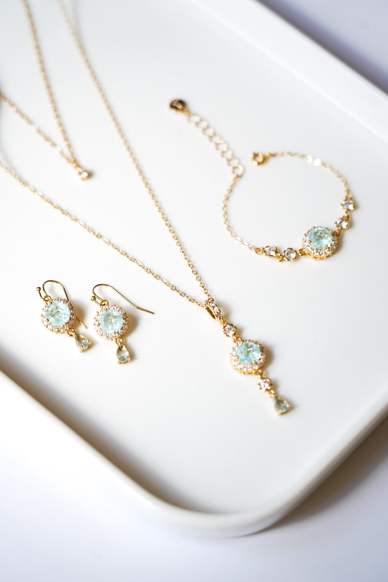 parure de bijoux mariage en or avec des pierres naturelles bleu turquoise